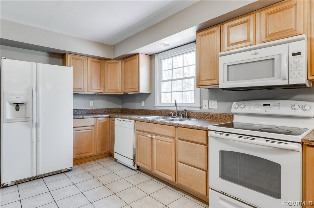 11000 Chalkley Road Chester, VA 23831 - Photo 5 of 30 a kitchen with granite countertop cabinets stainless steel appliances a sink and a window