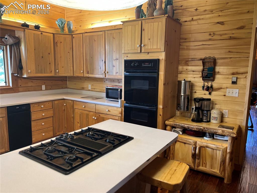 87 Thompson Road Gardner, CO 81040 - Photo 16 of 46 a kitchen with a sink stove and cabinets