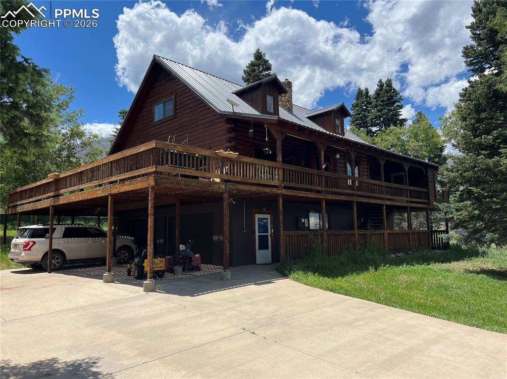 87 Thompson Road Gardner, CO 81040 - Photo 2 of 46 a view of a house with a yard and potted plants