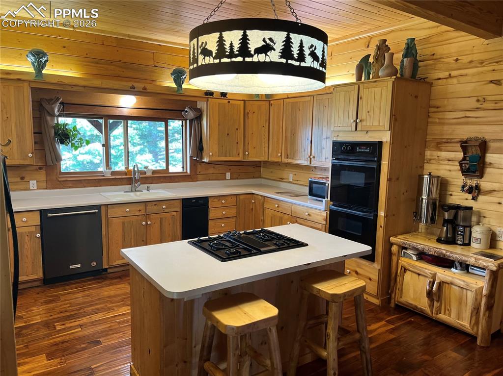 87 Thompson Road Gardner, CO 81040 - Photo 21 of 46 a kitchen with a stove a refrigerator and a table