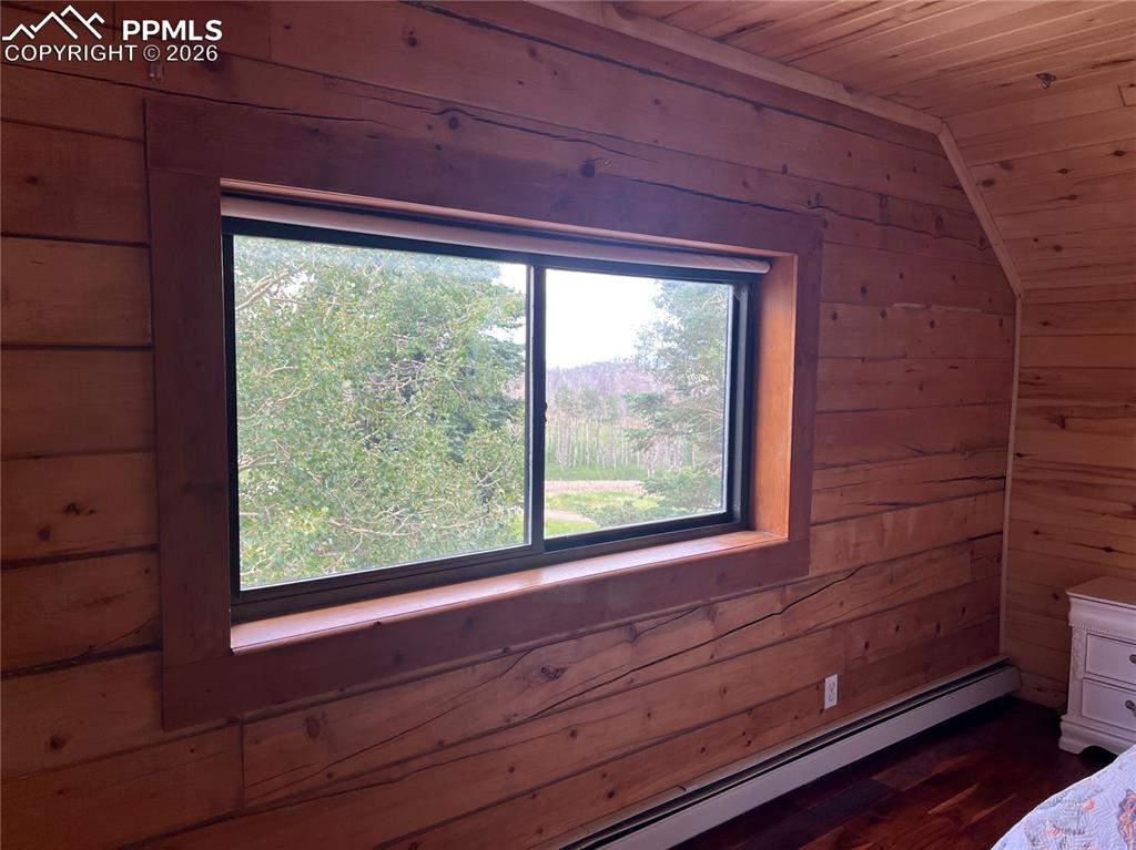 87 Thompson Road Gardner, CO 81040 - Photo 37 of 46 a view of a room that has a large window and wooden floor