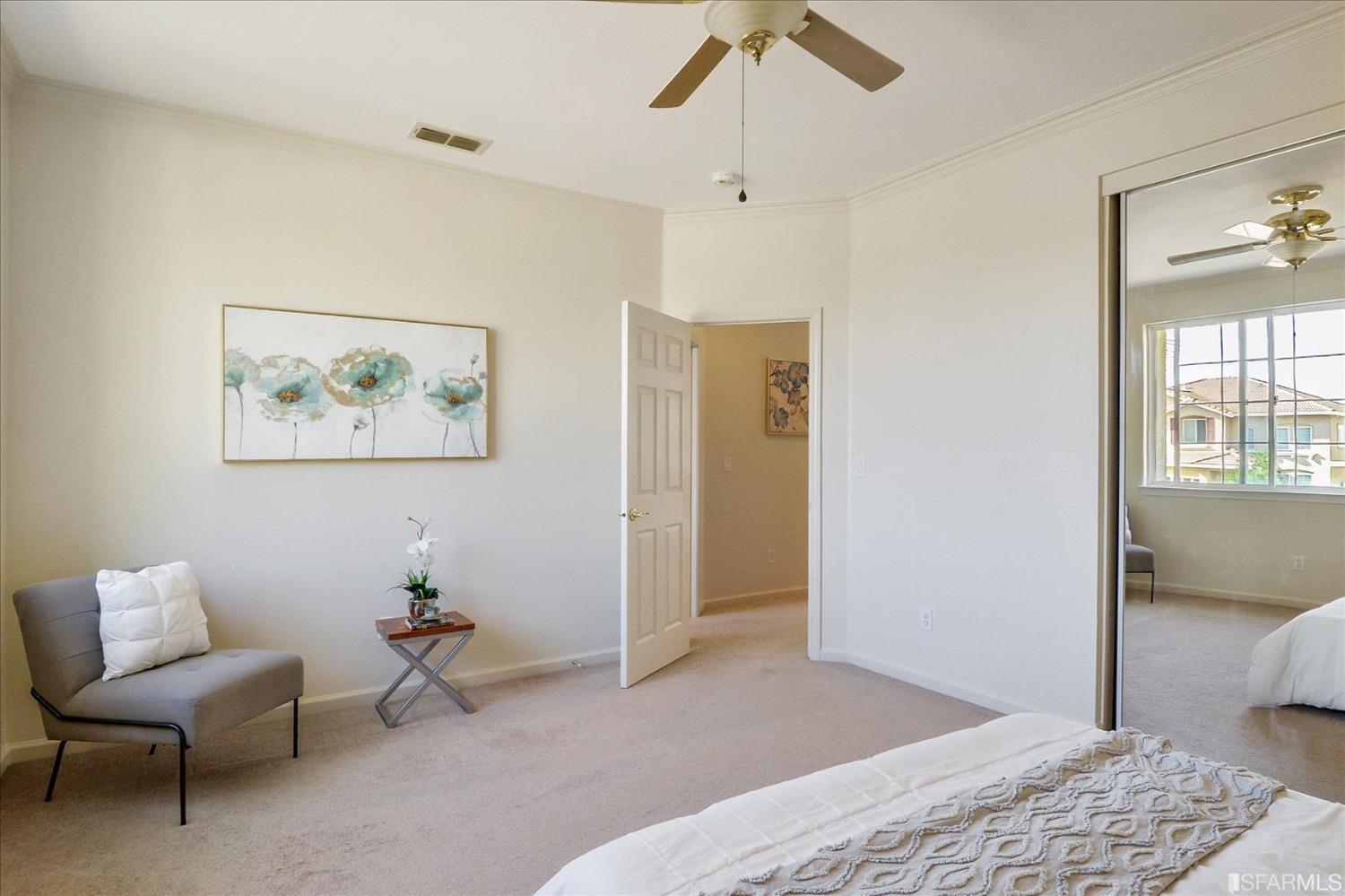 4100 Diorite Court Antioch, CA 94531 - Photo 30 of 58 a bedroom with a bed and a chair
