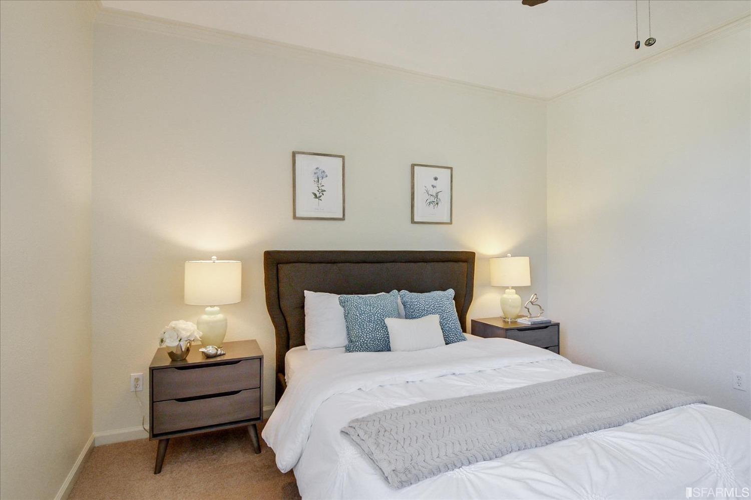 4100 Diorite Court Antioch, CA 94531 - Photo 32 of 58 a bedroom with a bed and lamp
