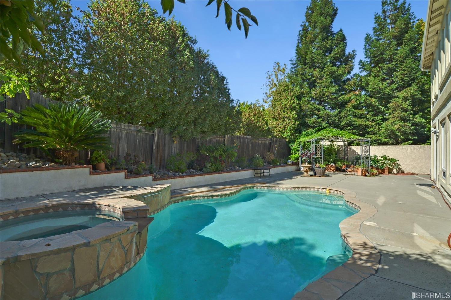 4100 Diorite Court Antioch, CA 94531 - Photo 47 of 58 a view of a backyard with swimming pool