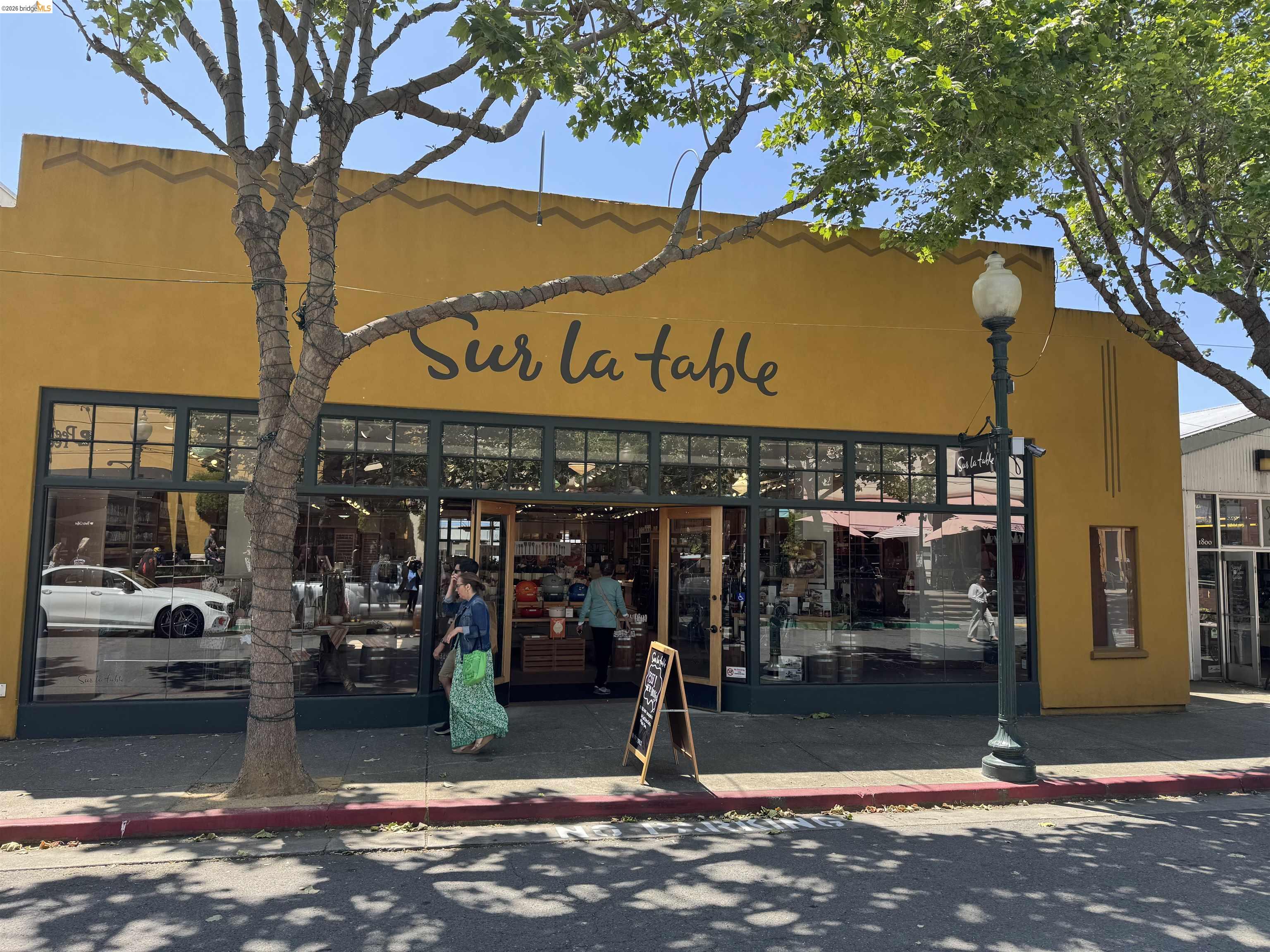 1450 Fourth Street, Unit 5 Berkeley, CA 94710 - Photo 23 of 26 a view of a street with stores