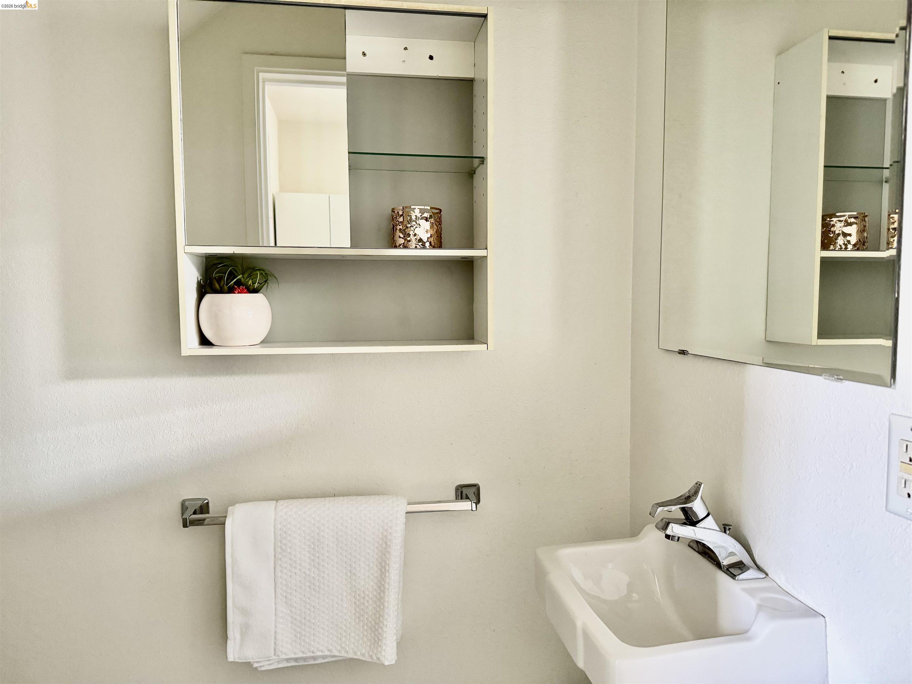 1450 Fourth Street, Unit 5 Berkeley, CA 94710 - Photo 9 of 26 a bathroom with a sink and a window