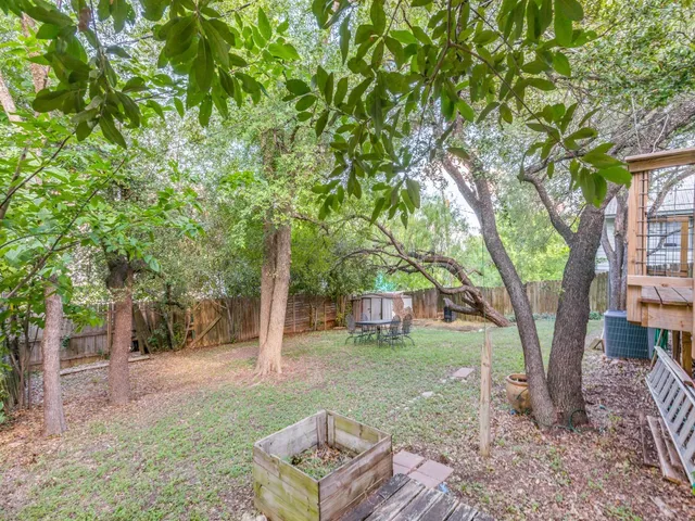 a backyard of a house with seating space