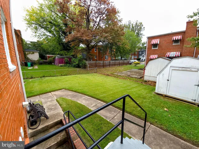 a backyard of a house with seating space