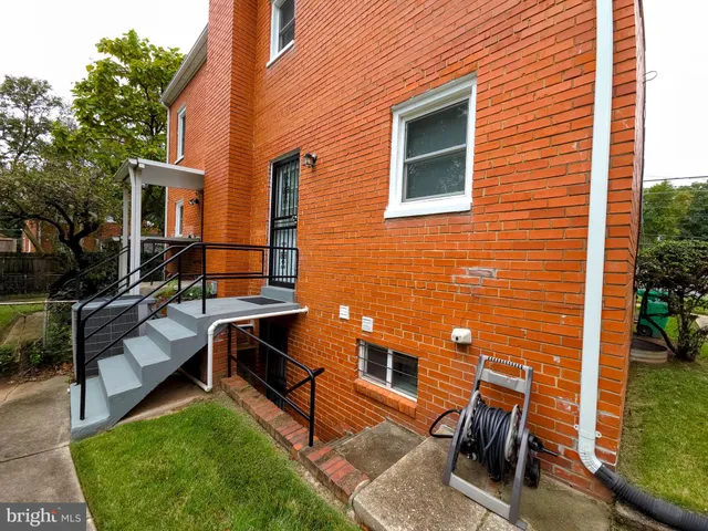 a front view of a house with yard