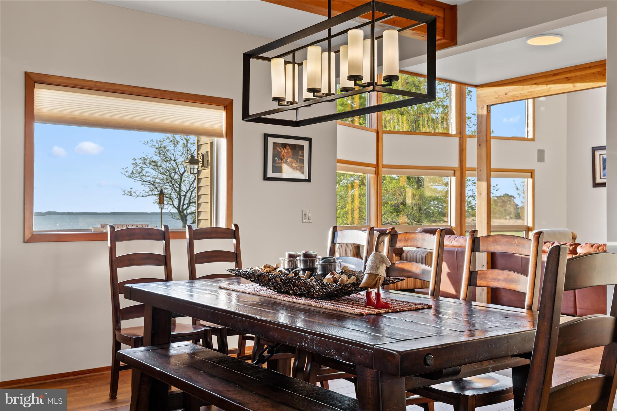 4808 Saltmarsh Lane Madison, MD 21648 - Photo 25 of 119 a view of a dining room with furniture window and outside view