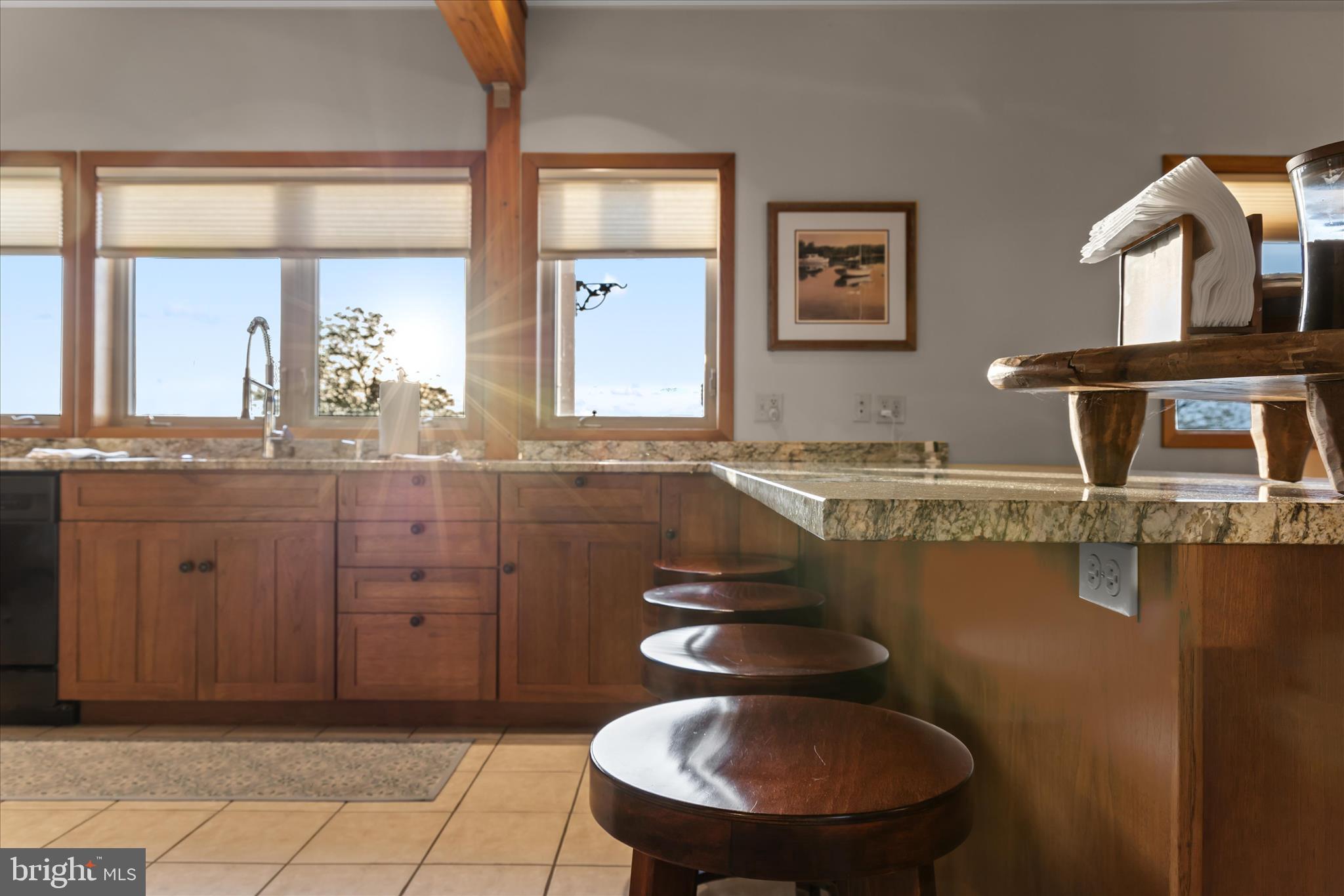 4808 Saltmarsh Lane Madison, MD 21648 - Photo 33 of 119 a bathroom with a granite countertop sink and a mirror