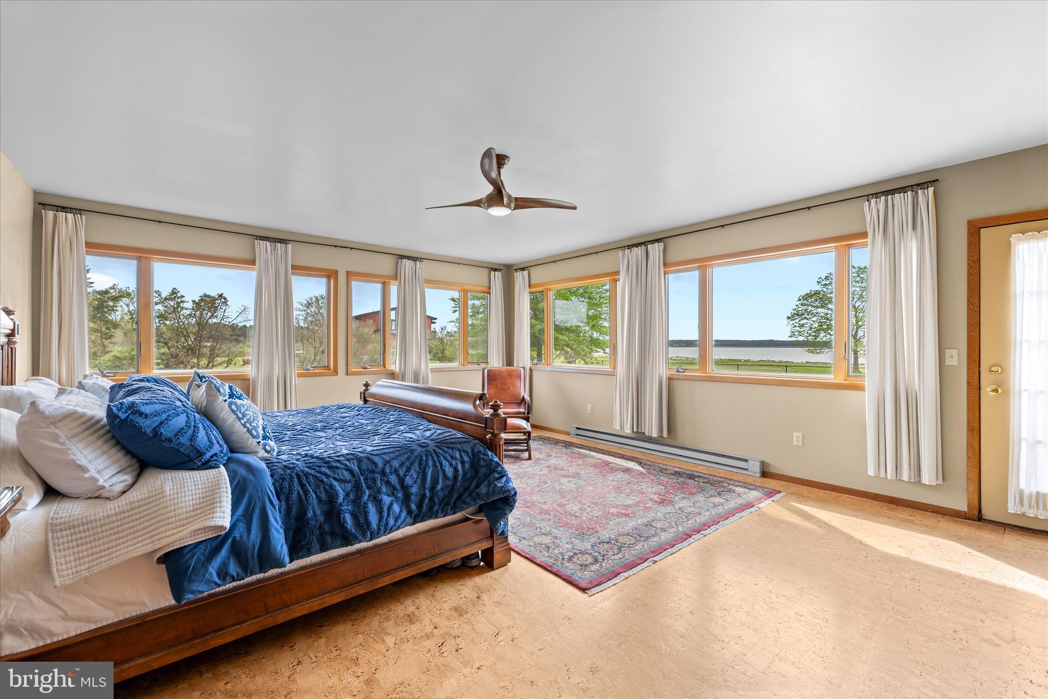 4808 Saltmarsh Lane Madison, MD 21648 - Photo 51 of 119 a bedroom with a bed and wooden floor