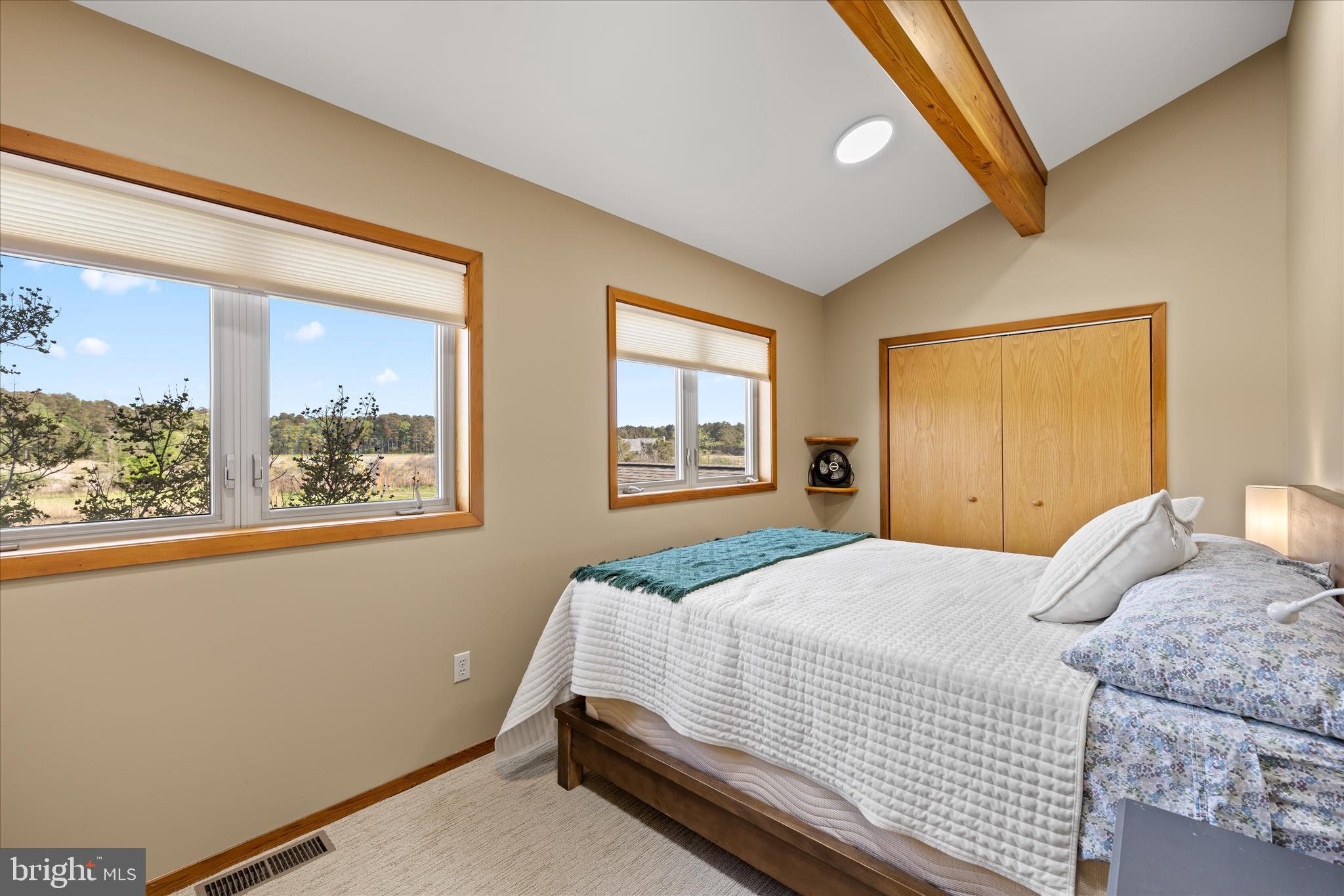 4808 Saltmarsh Lane Madison, MD 21648 - Photo 72 of 119 a bedroom with a bed and a large window