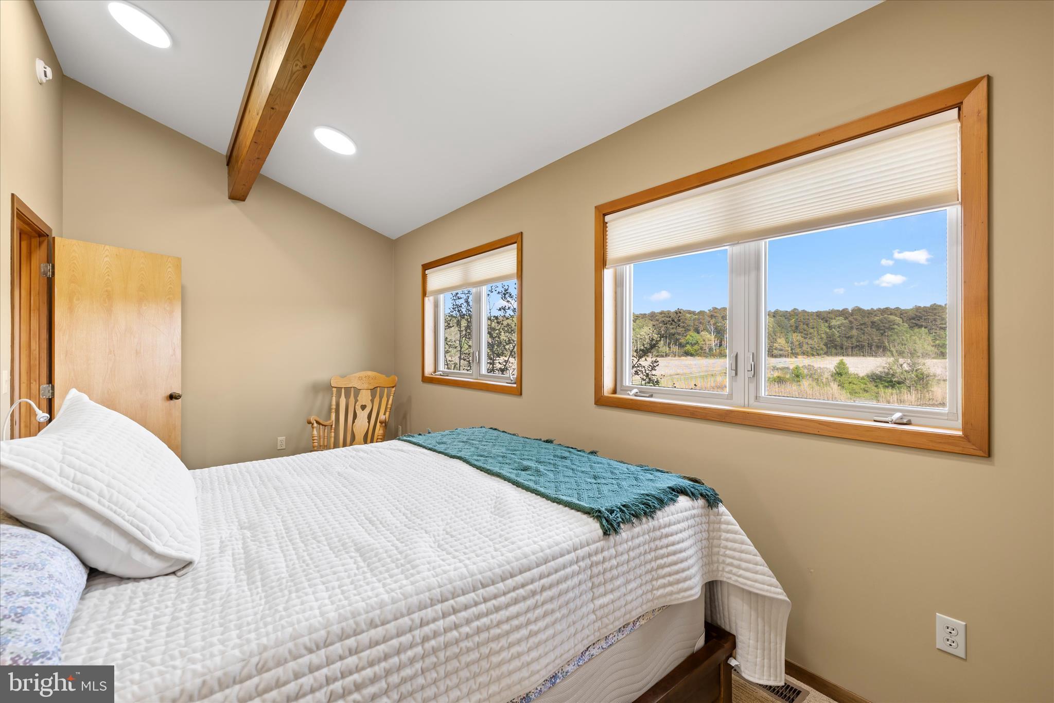 4808 Saltmarsh Lane Madison, MD 21648 - Photo 74 of 119 a bedroom with a bed and a window