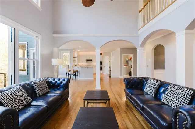 a kitchen with cabinets a sink and wooden floor