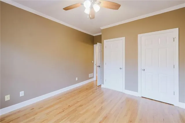a bathroom with a shower curtain sink and a toilet