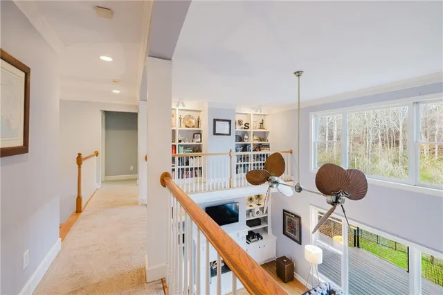 a room with furniture and a large window