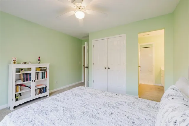 an aerial view of a houses with a lake view