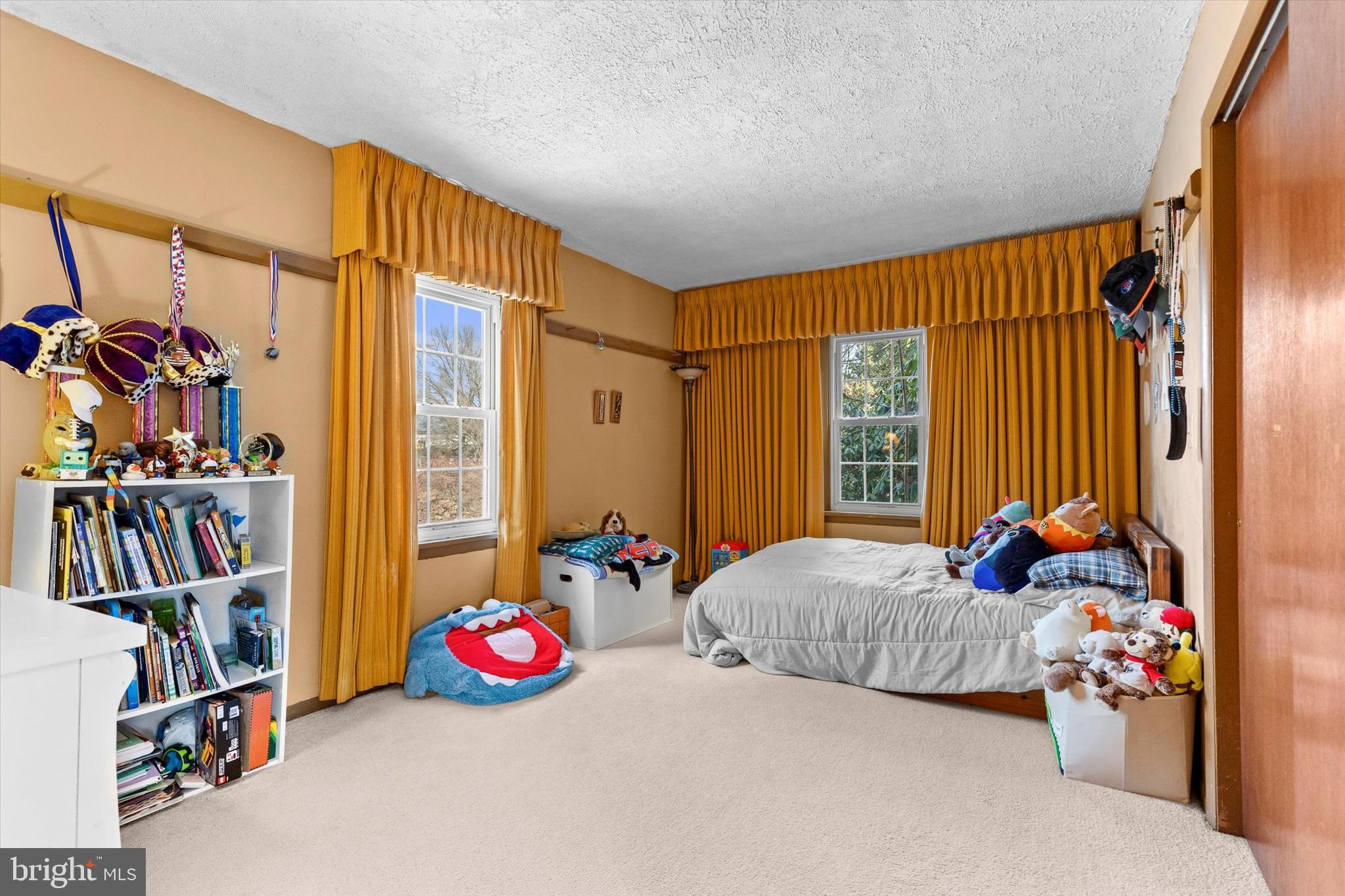 1365 Highway 209 Millersburg, PA 17061 - Photo 15 of 43 a bedroom with bed and a book shelf