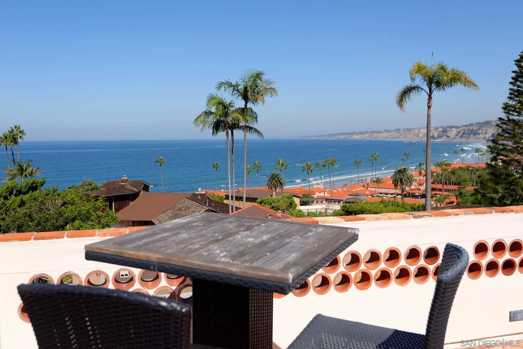 1908 Hypatia Way La Jolla, CA 92037 - Photo 4 of 29 a terrace with a table and chairs