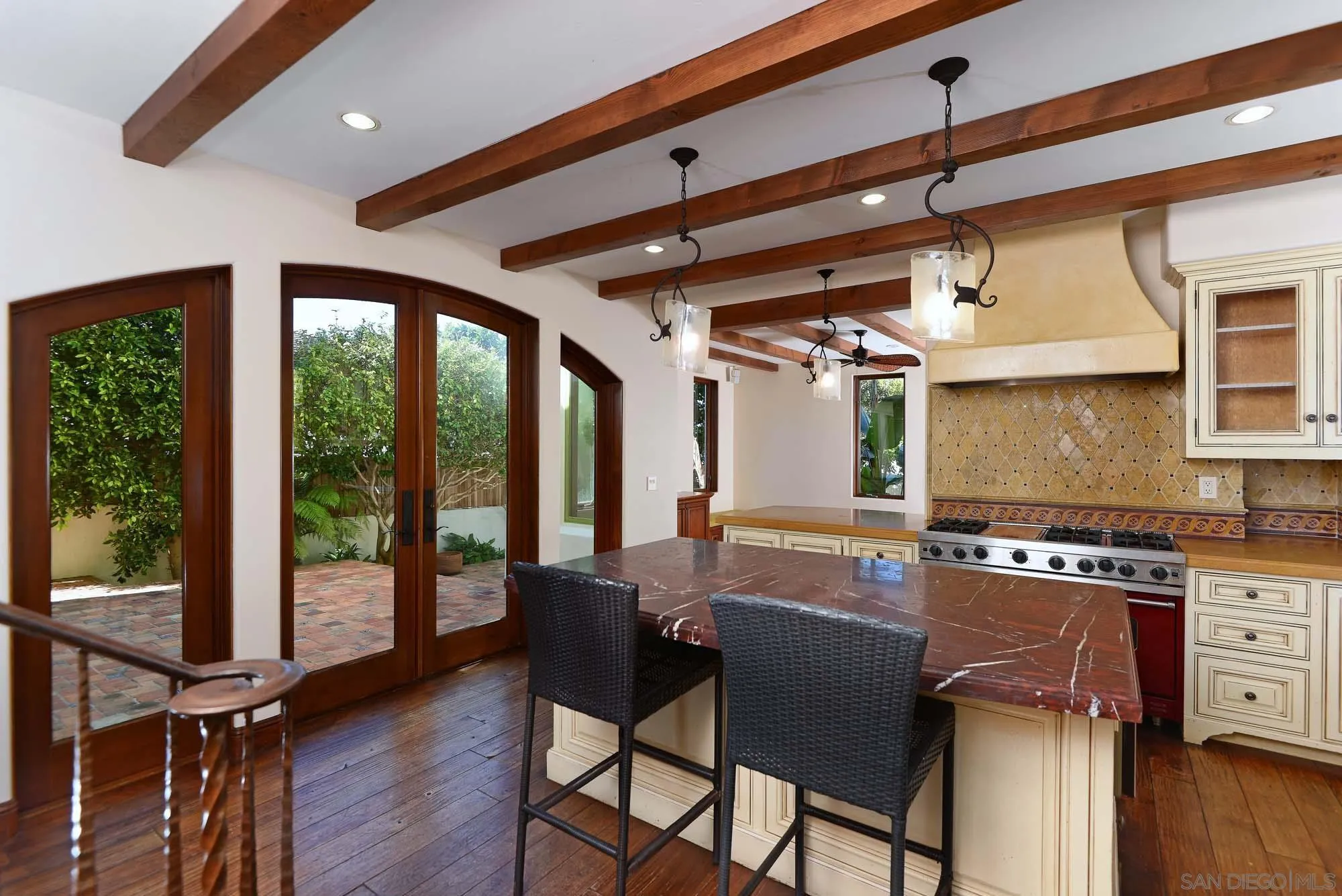 1908 Hypatia Way La Jolla, CA 92037 - Photo 9 of 29 a view of a dining room with furniture window and wooden floor