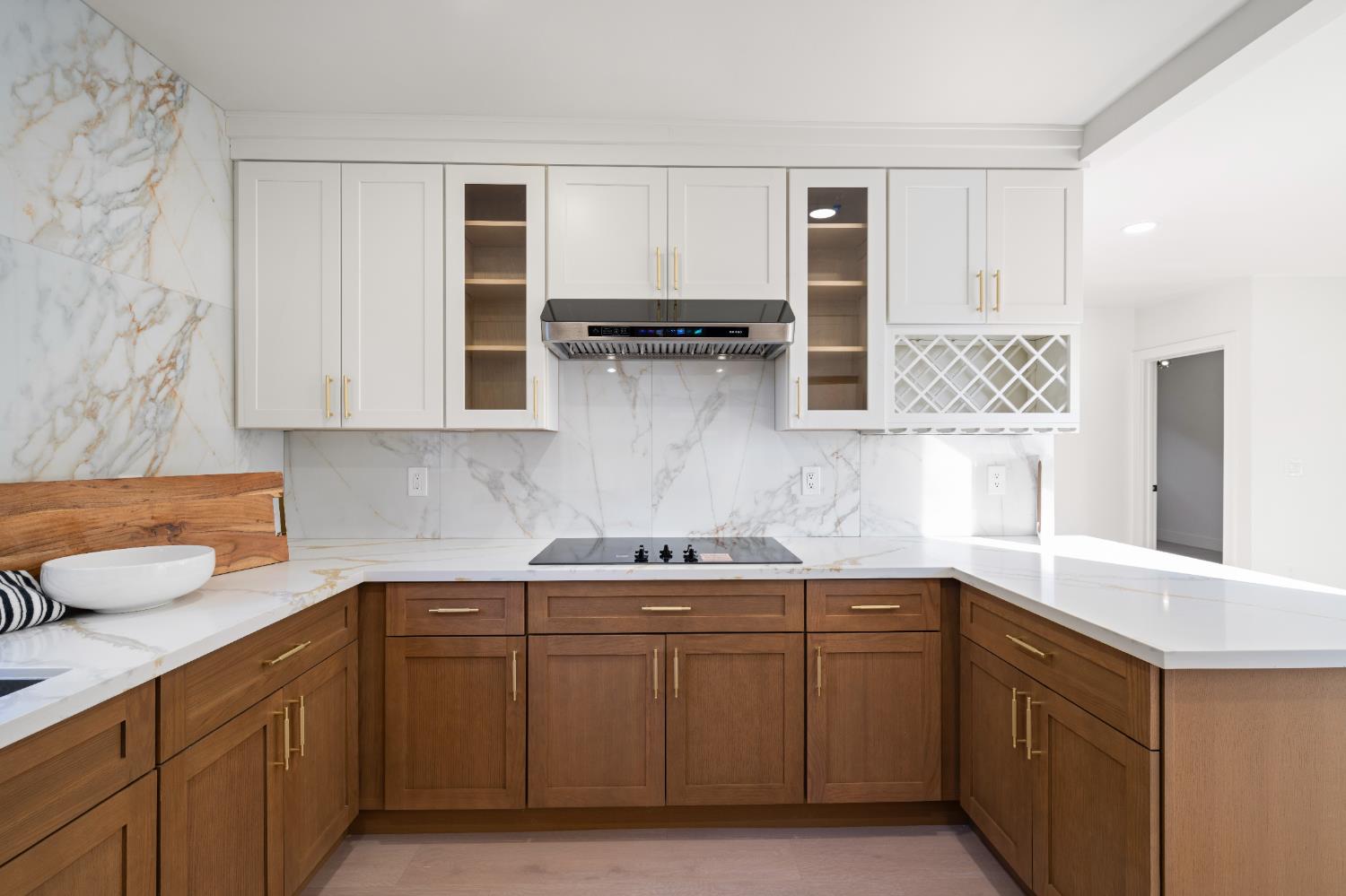 5401 J Street Sacramento, CA 95819 - Photo 21 of 71 a kitchen with stainless steel appliances granite countertop a sink and cabinets with wooden floor