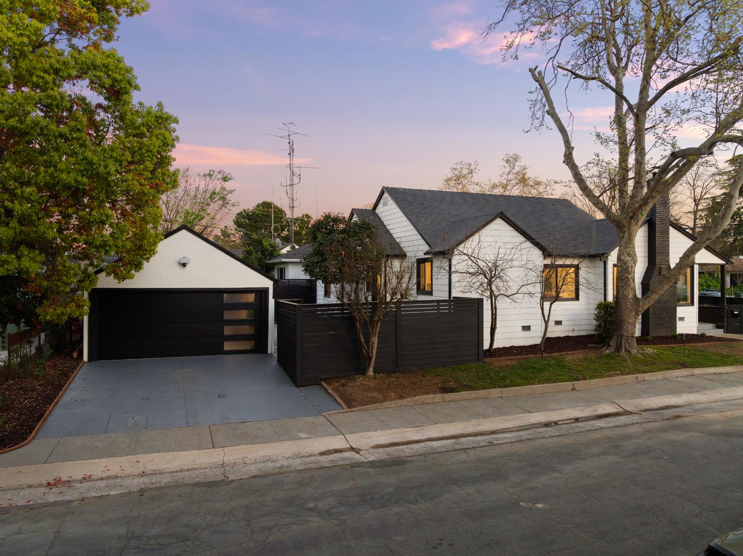 5401 J Street Sacramento, CA 95819 - Photo 60 of 71 a front view of a house with a garage