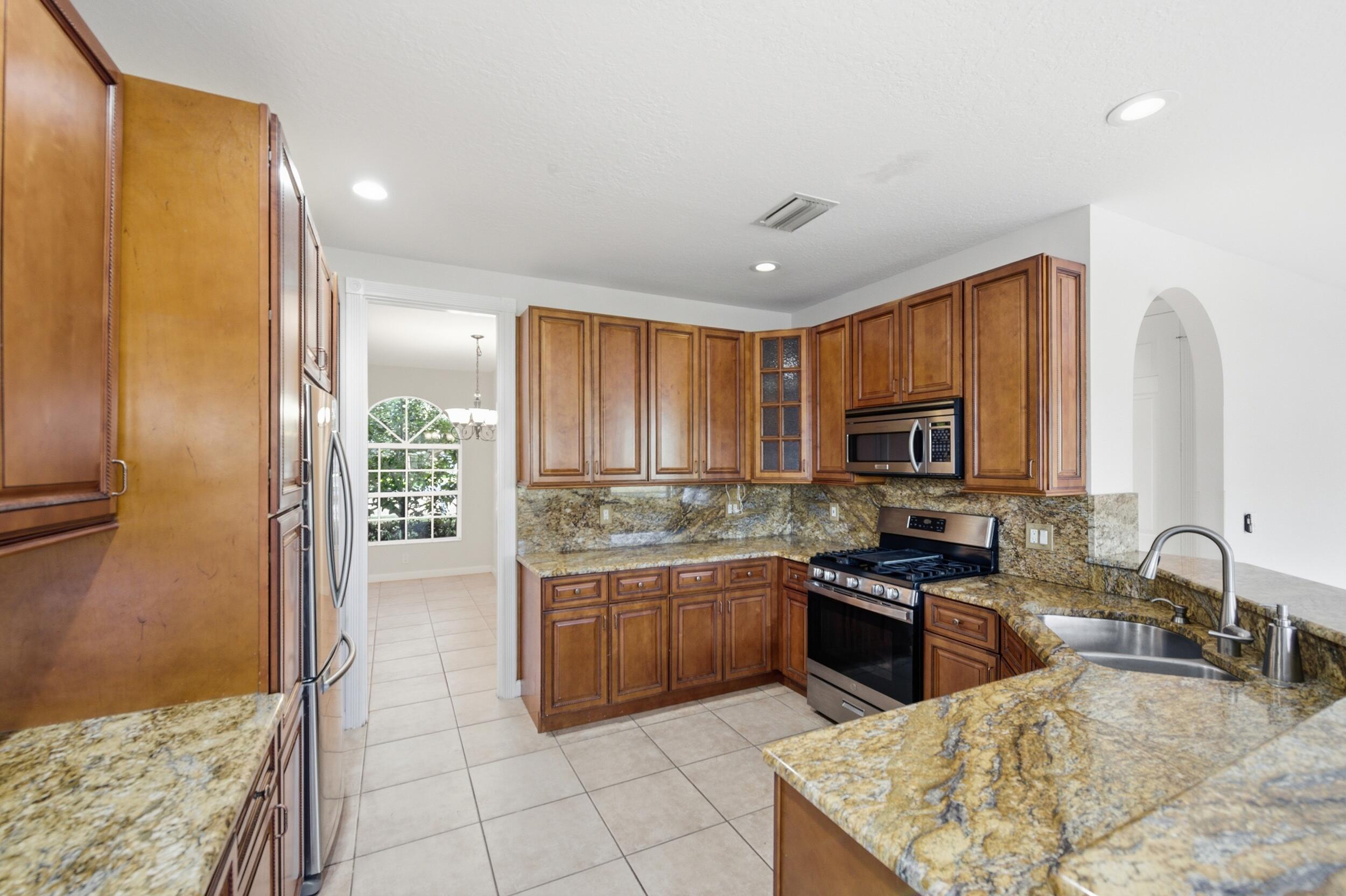207 Banyanwood Point Jupiter, FL 33458 - Photo 2 of 47 Kitchen