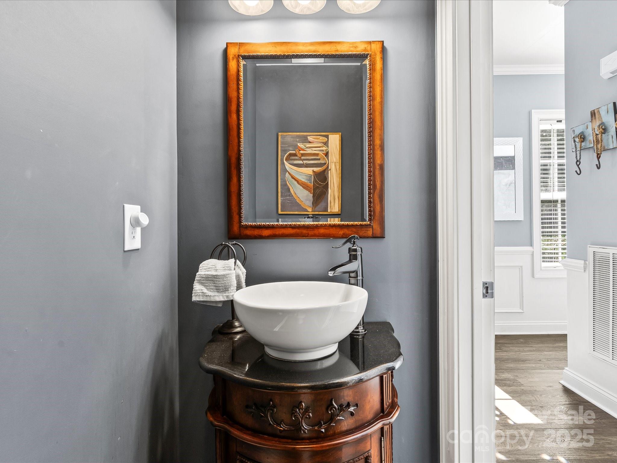 172 Beaten Path Road Mooresville, NC 28117 - Photo 20 of 48 a bathroom with a toilet and a sink