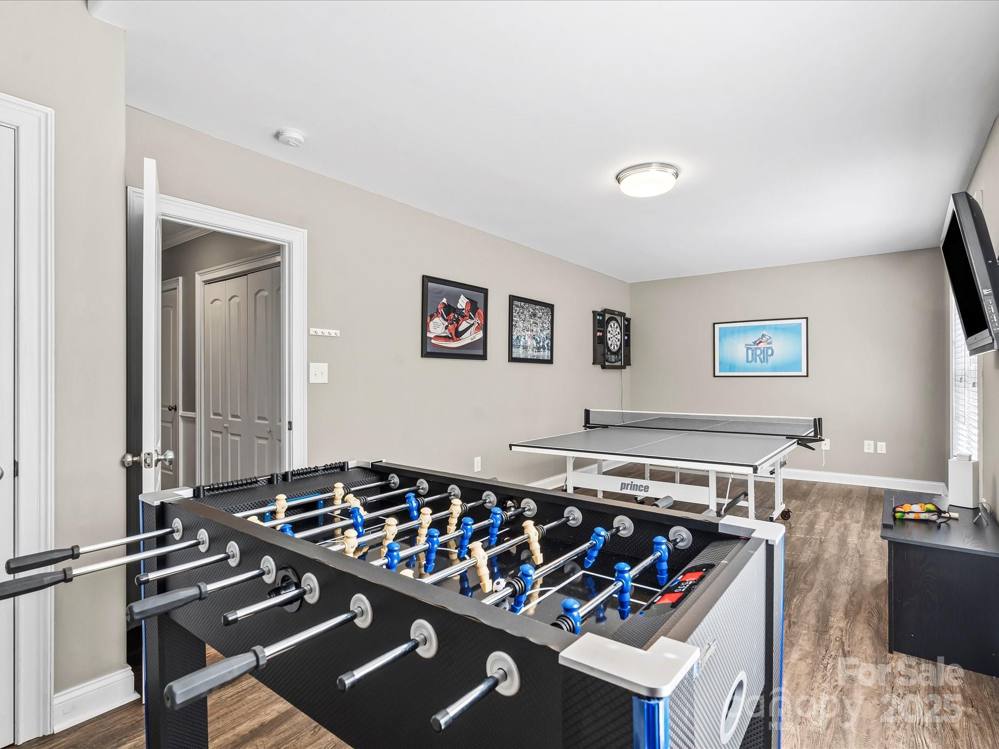 172 Beaten Path Road Mooresville, NC 28117 - Photo 21 of 48 a living room with a couch and a stove top oven