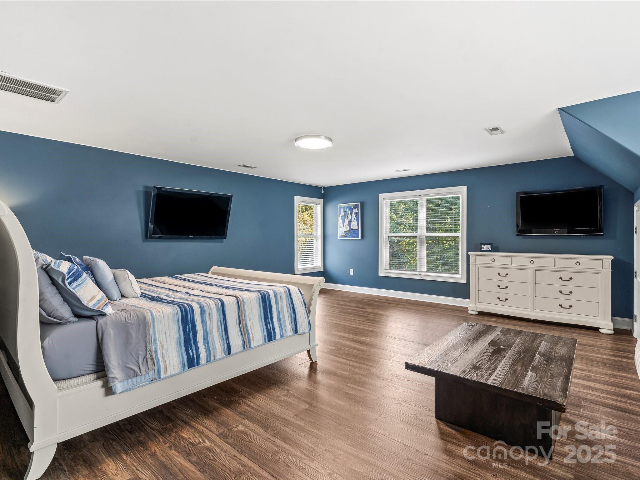172 Beaten Path Road Mooresville, NC 28117 - Photo 25 of 48 a living room with furniture and a flat screen tv