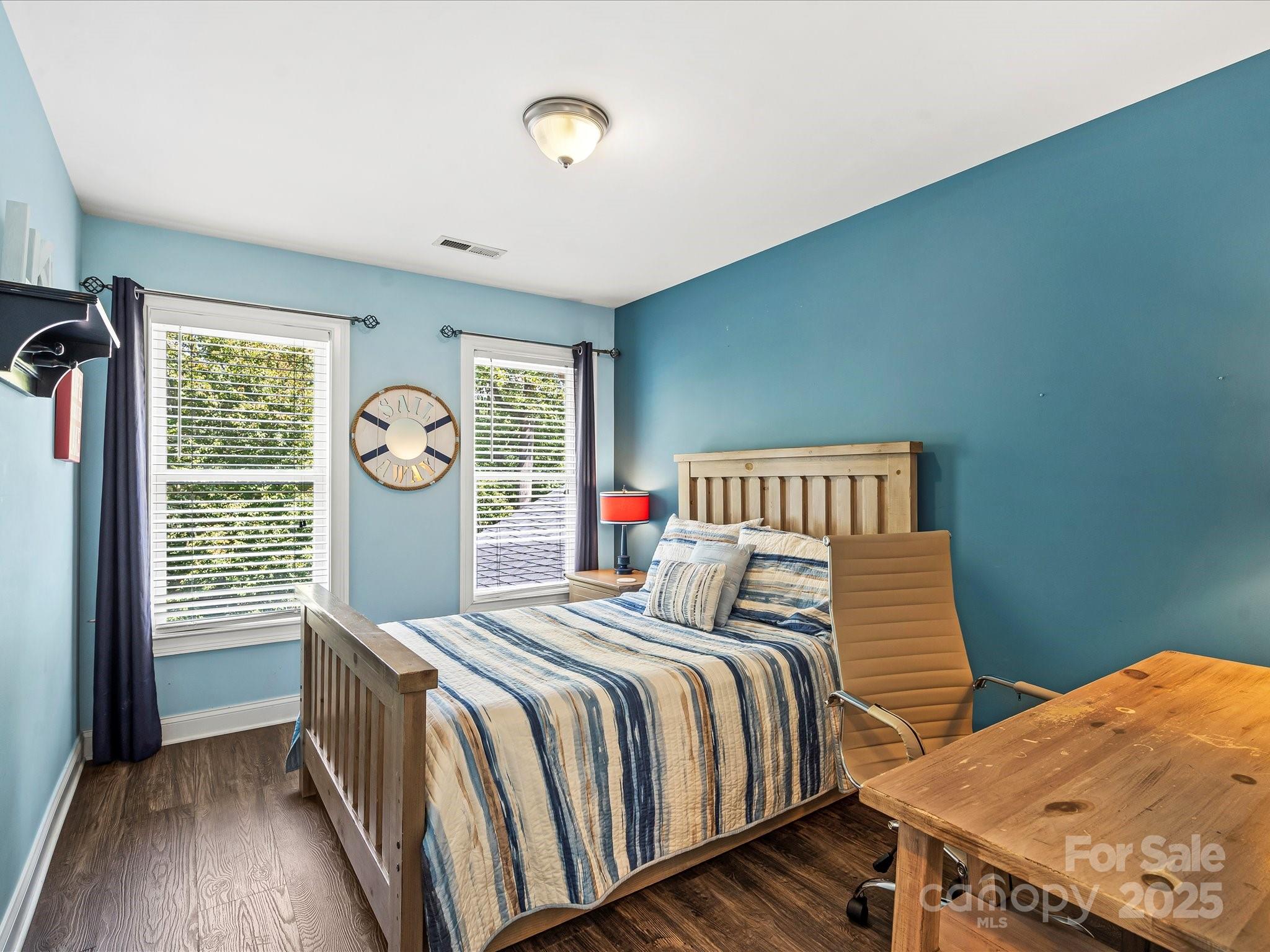 172 Beaten Path Road Mooresville, NC 28117 - Photo 26 of 48 a bedroom with a bed and a window