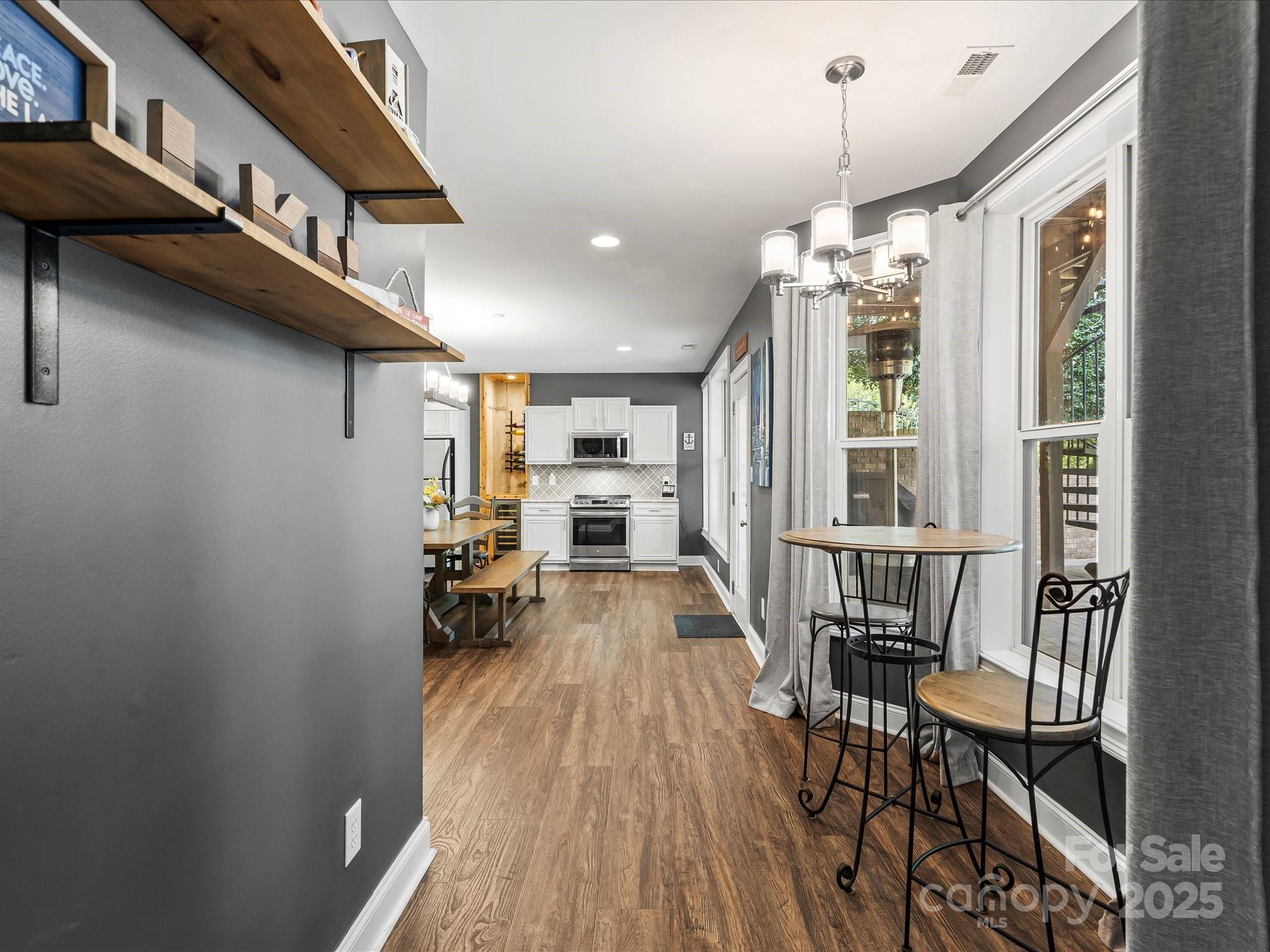 172 Beaten Path Road Mooresville, NC 28117 - Photo 32 of 48 a view of a dining room with furniture and a window