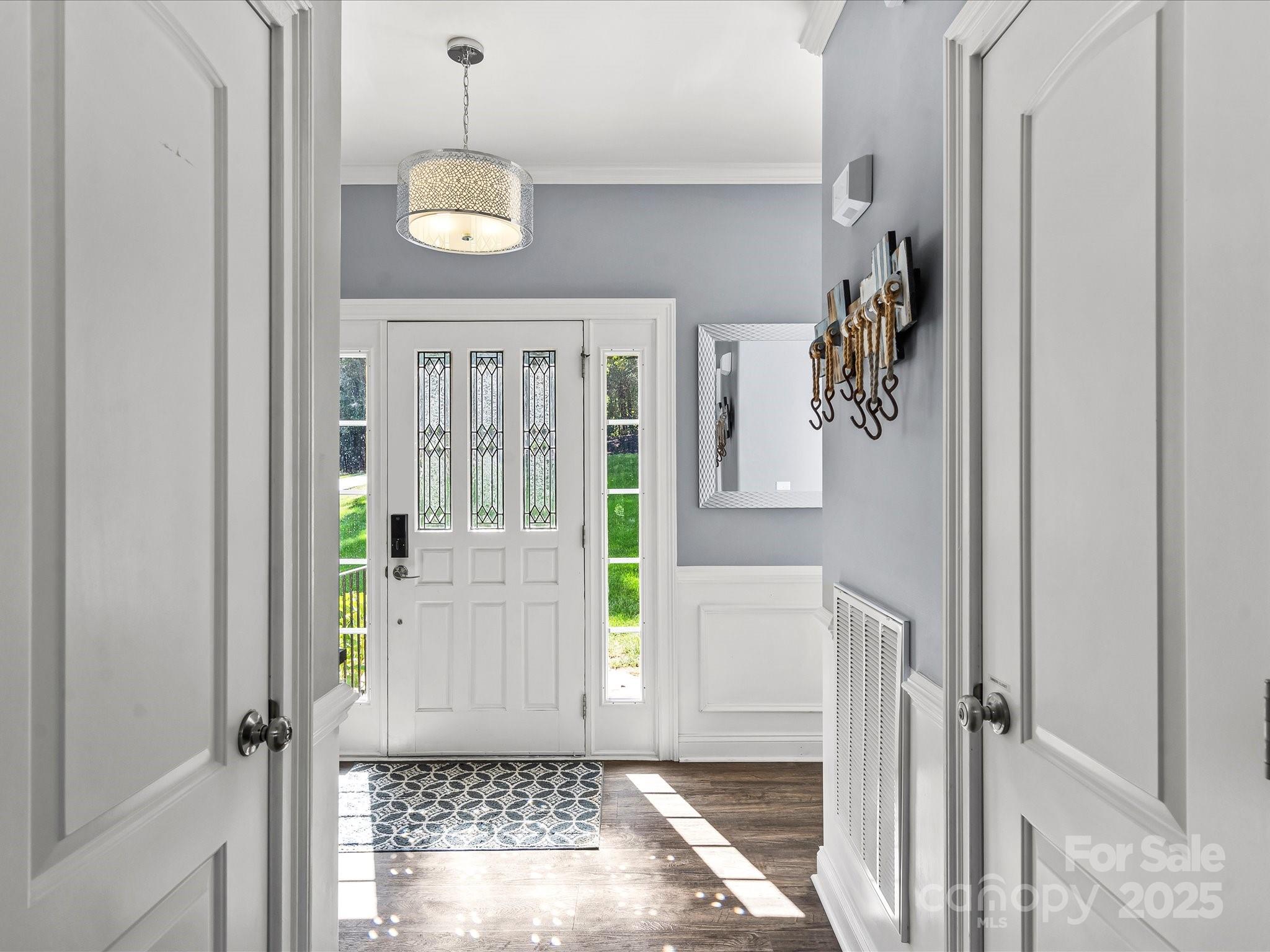 172 Beaten Path Road Mooresville, NC 28117 - Photo 4 of 48 a view of an entryway with wooden floor