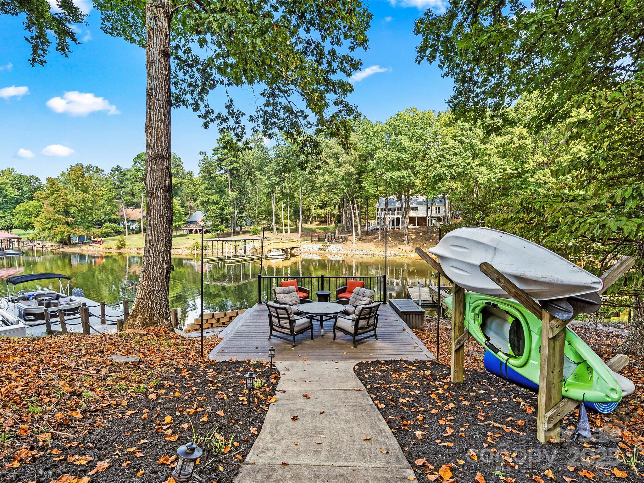 172 Beaten Path Road Mooresville, NC 28117 - Photo 44 of 48 an outdoor space with furniture and garden
