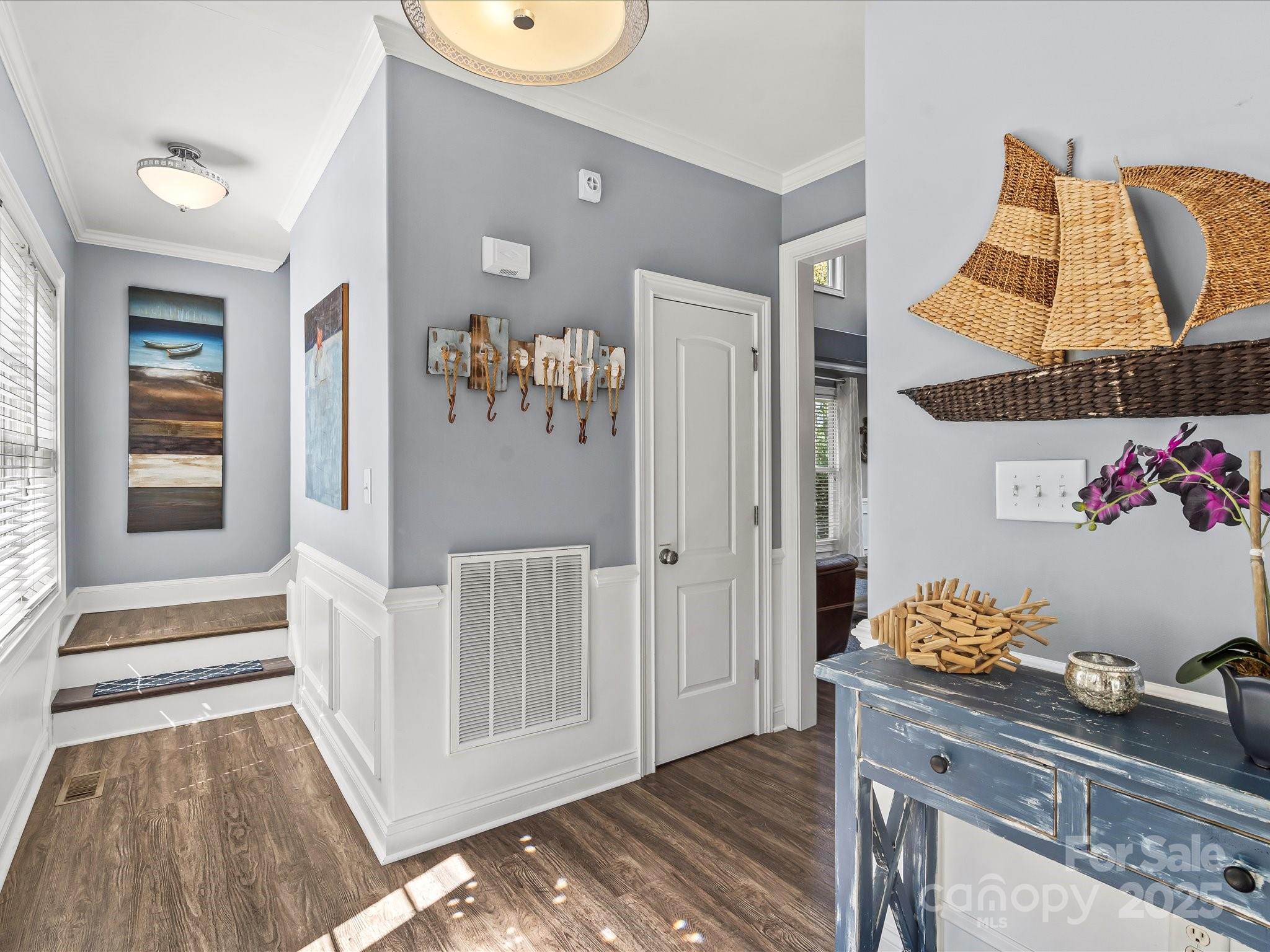 172 Beaten Path Road Mooresville, NC 28117 - Photo 5 of 48 a view of hallway with furniture and wooden floor