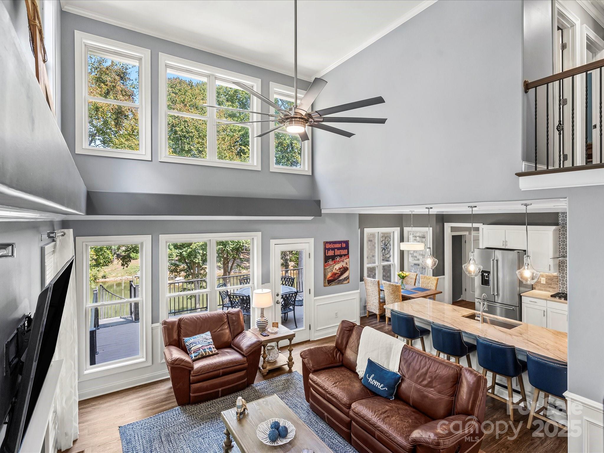 172 Beaten Path Road Mooresville, NC 28117 - Photo 9 of 48 a living room with furniture and a large window