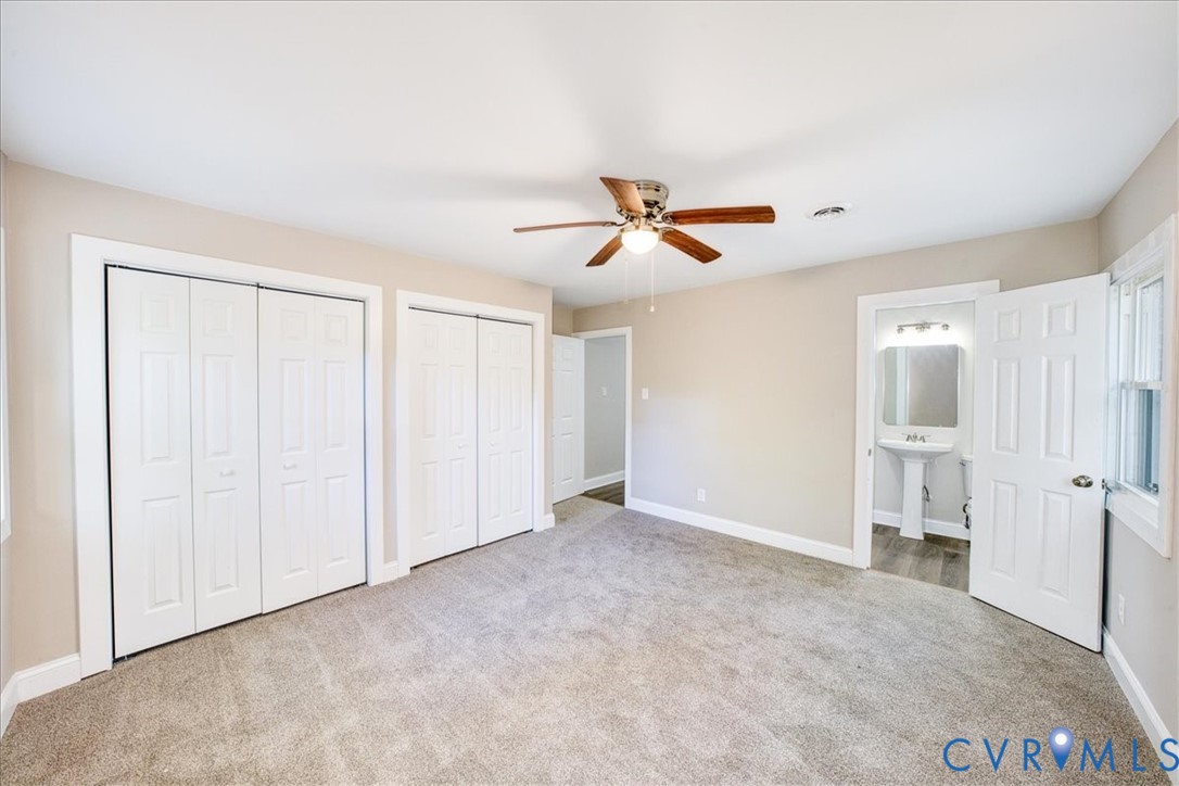 3600 Sherbrook Road Richmond, VA 23235 - Photo 13 of 26 an empty room with closet and windows