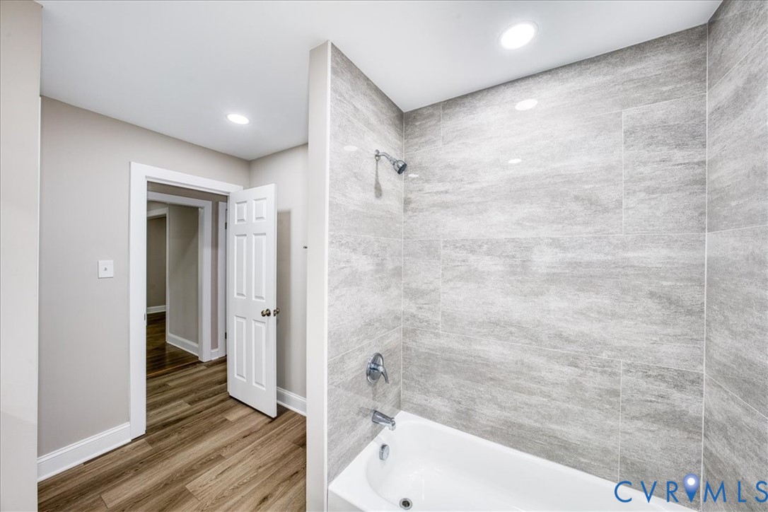 3600 Sherbrook Road Richmond, VA 23235 - Photo 19 of 26 a bathroom with a bathtub and a shower