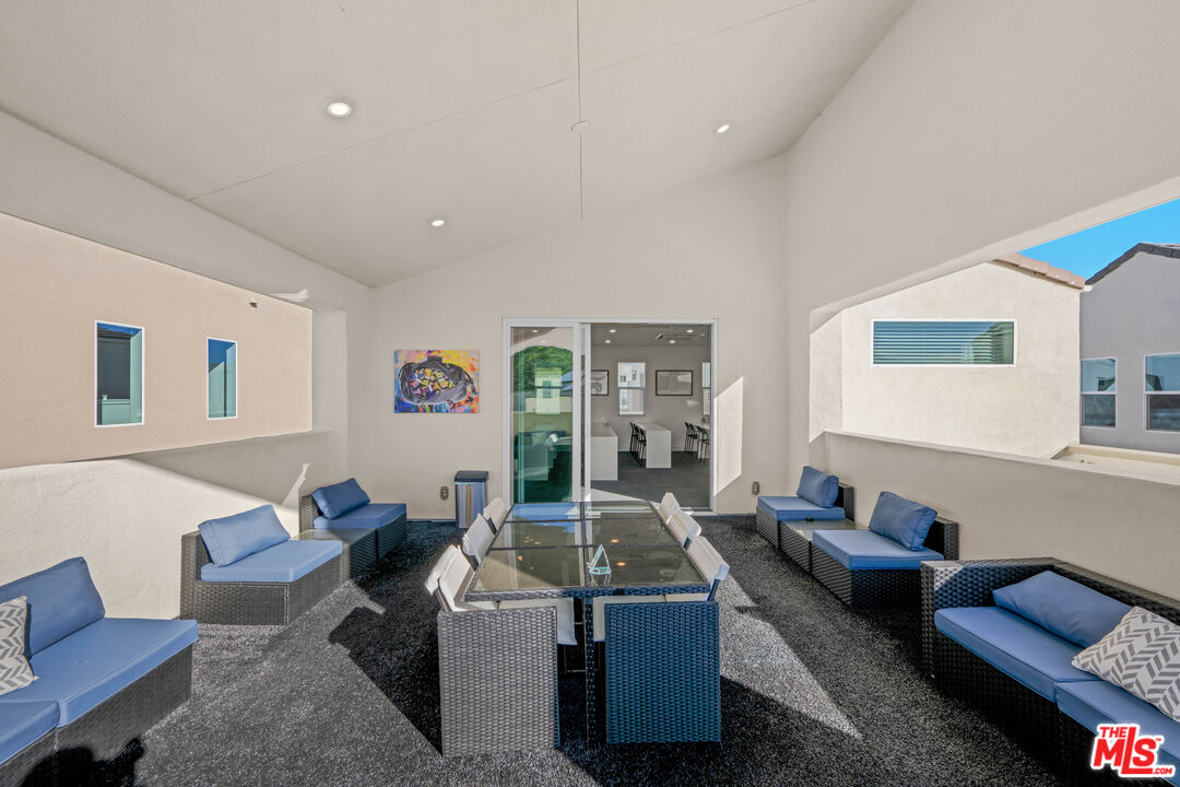 26710 Beartown Lane Stevenson Ranch, CA 91381 - Photo 12 of 21 a living room with furniture and a rug