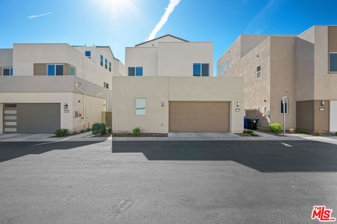 26710 Beartown Lane Stevenson Ranch, CA 91381 - Photo 16 of 21 front view of a house with a street