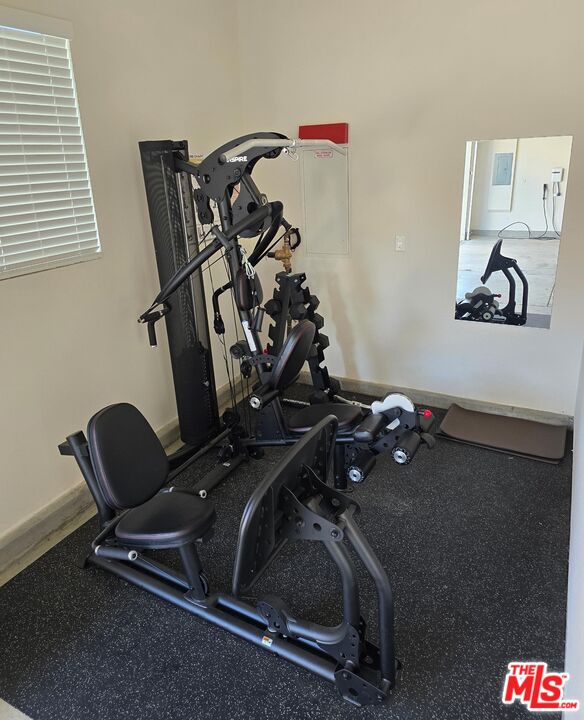 26710 Beartown Lane Stevenson Ranch, CA 91381 - Photo 19 of 21 a view of a room with gym equipment