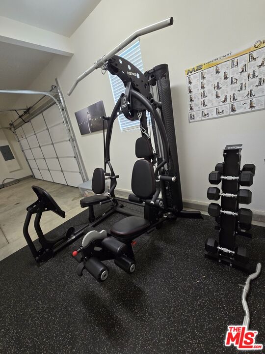 26710 Beartown Lane Stevenson Ranch, CA 91381 - Photo 21 of 21 a view of a room with gym equipment