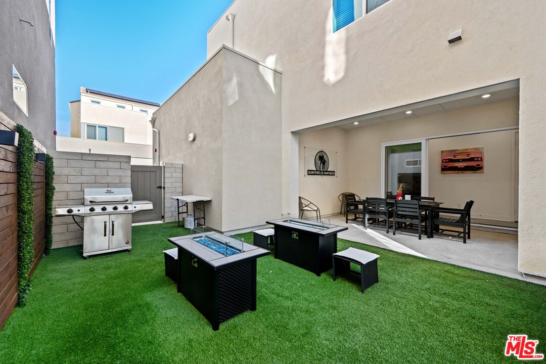 26710 Beartown Lane Stevenson Ranch, CA 91381 - Photo 6 of 21 a living room with furniture and a gate