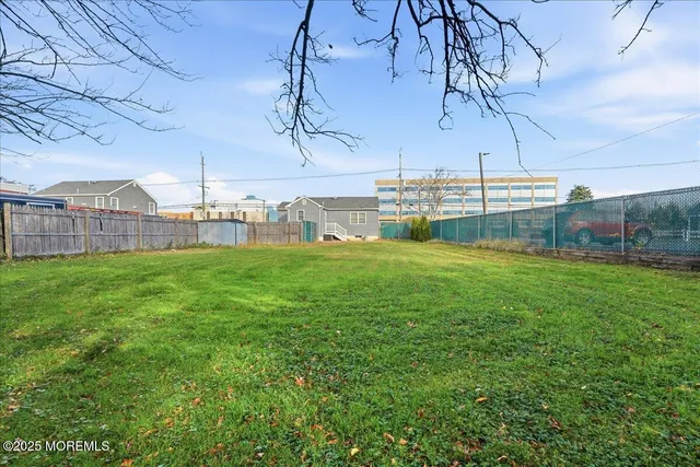 a view of a house with a big yard