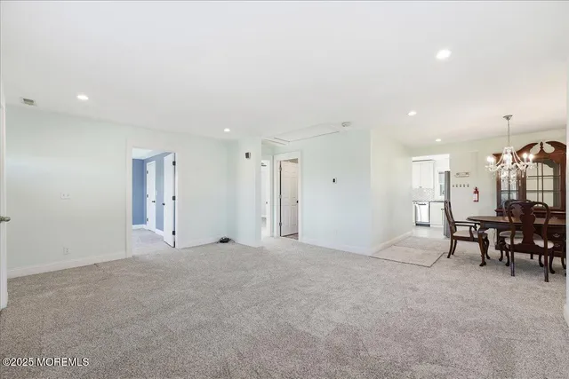 a view of a livingroom and a garage