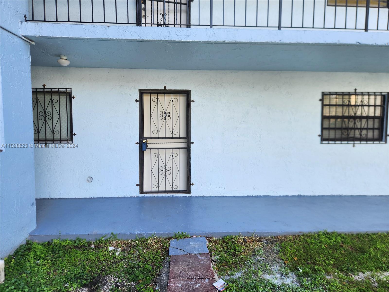 6259 West 24th Avenue, Unit 1028 Hialeah, FL 33016 - Photo 7 of 22 a view of outdoor space and yard