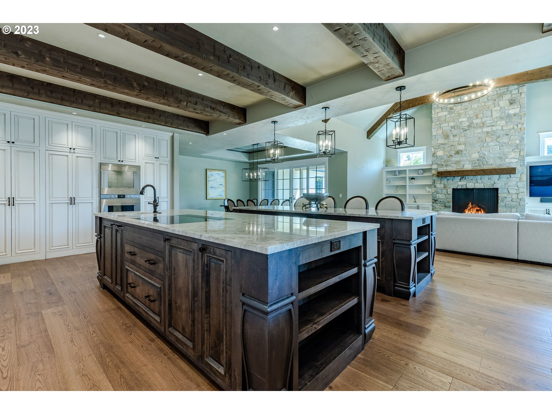4075 Gilham Road Eugene, OR 97408 - Photo 12 of 48 a kitchen with stainless steel appliances granite countertop a stove and cabinets