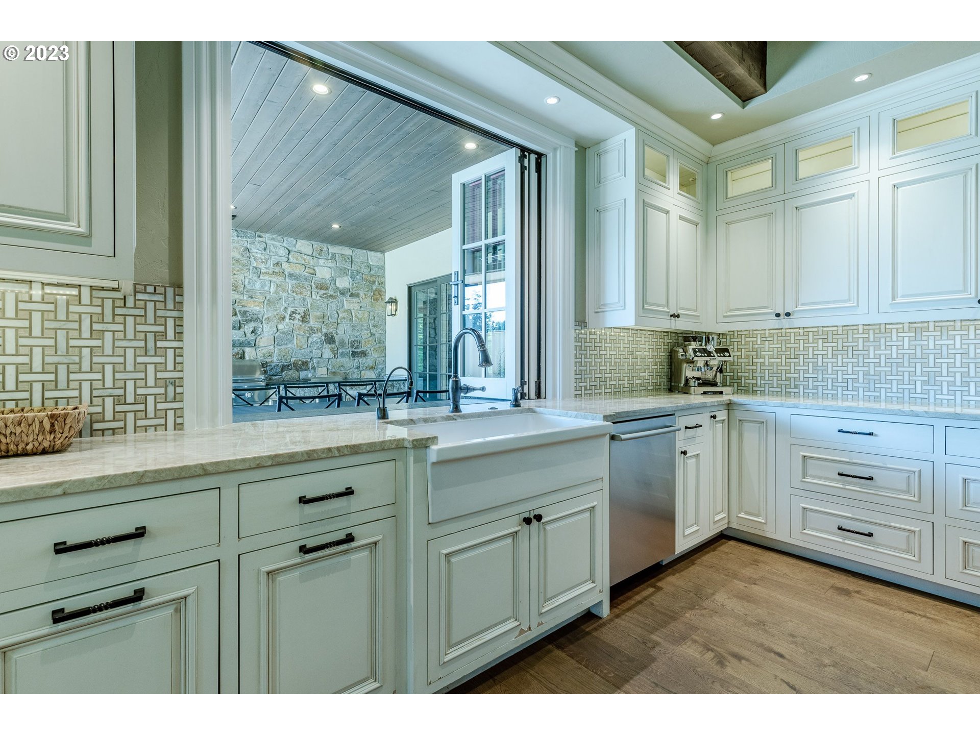 4075 Gilham Road Eugene, OR 97408 - Photo 13 of 48 a kitchen with sink cabinets and window
