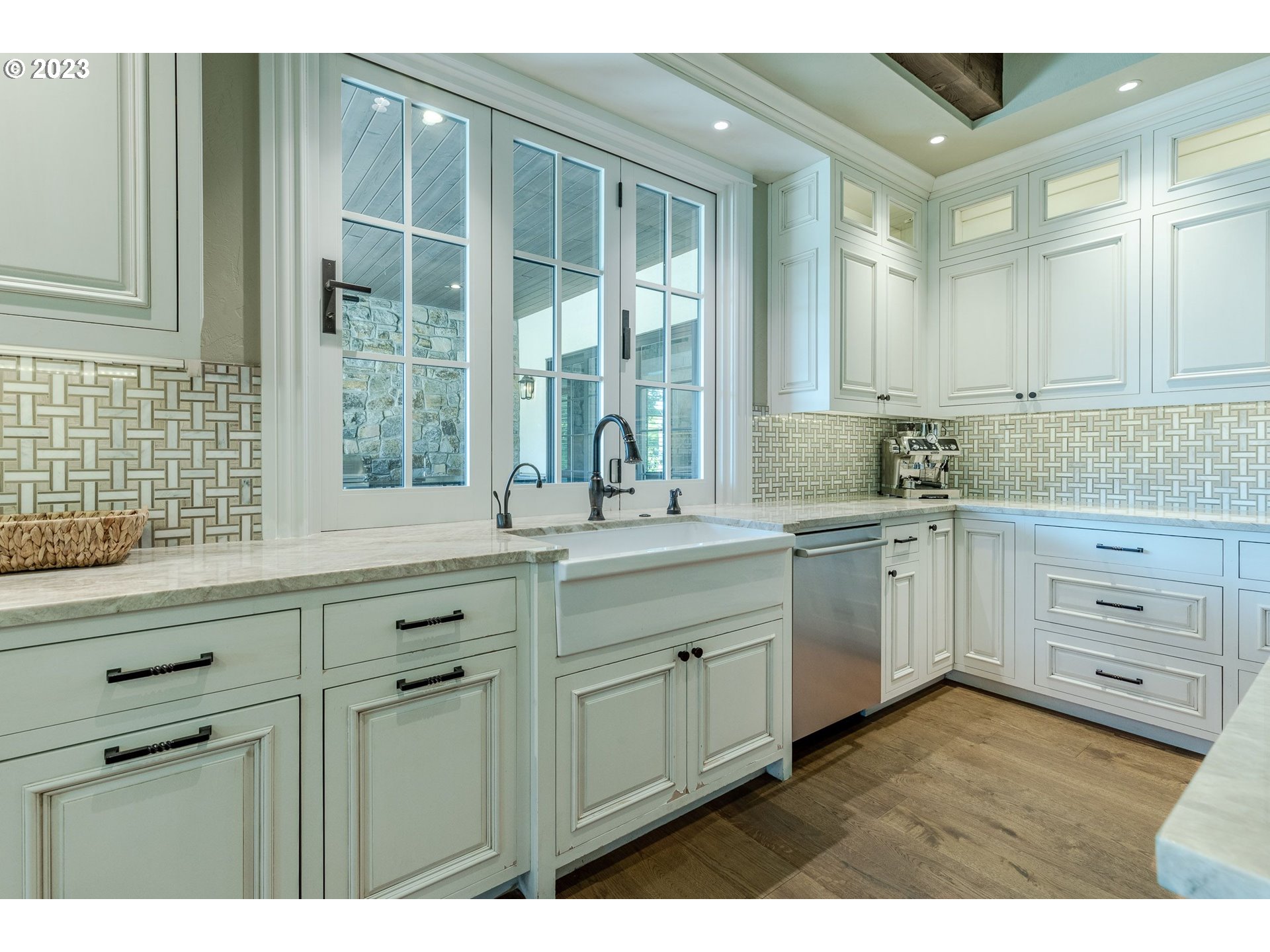 4075 Gilham Road Eugene, OR 97408 - Photo 14 of 48 a kitchen with cabinets appliances and a window
